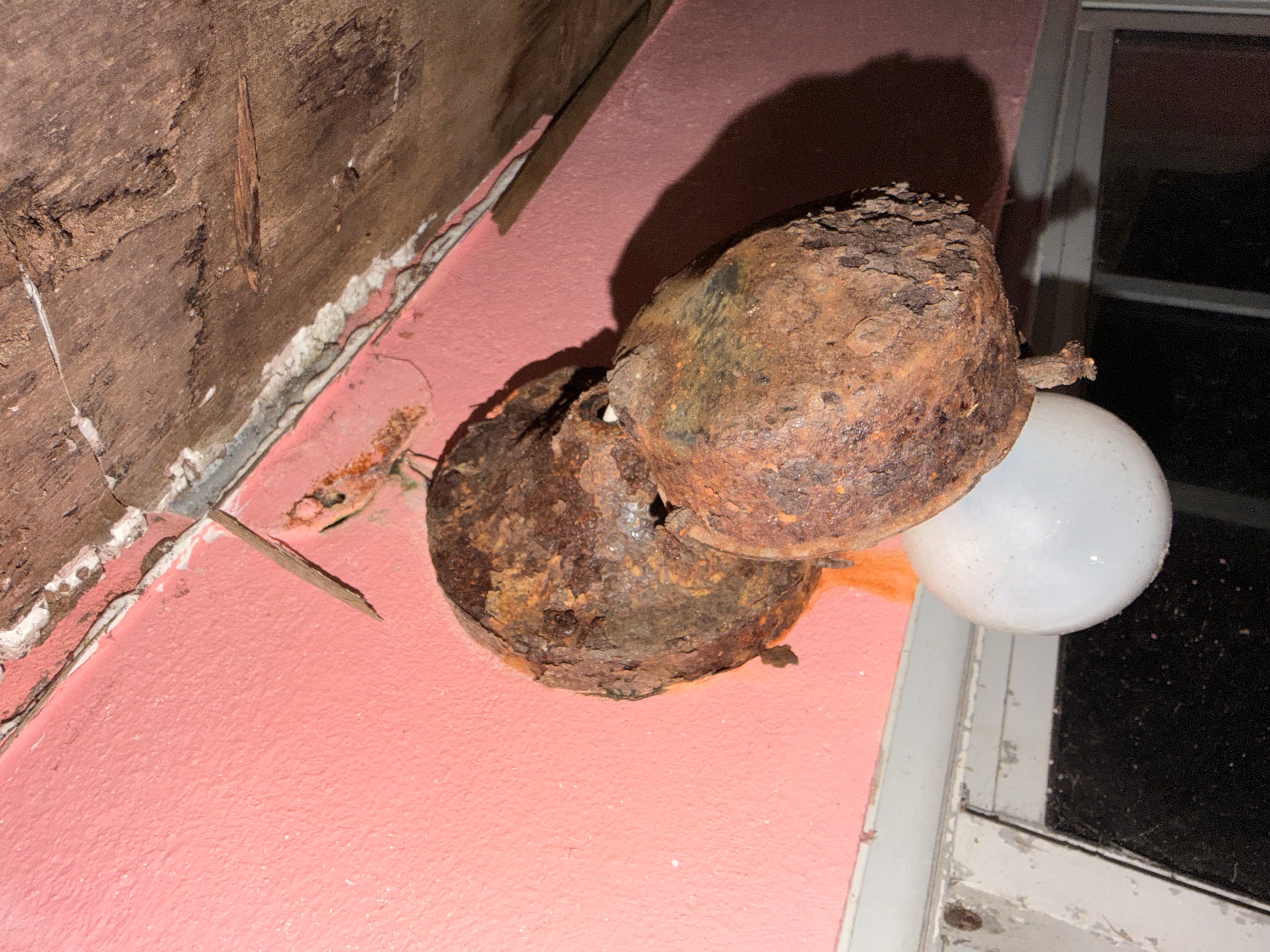 Corroded exterior light fixture