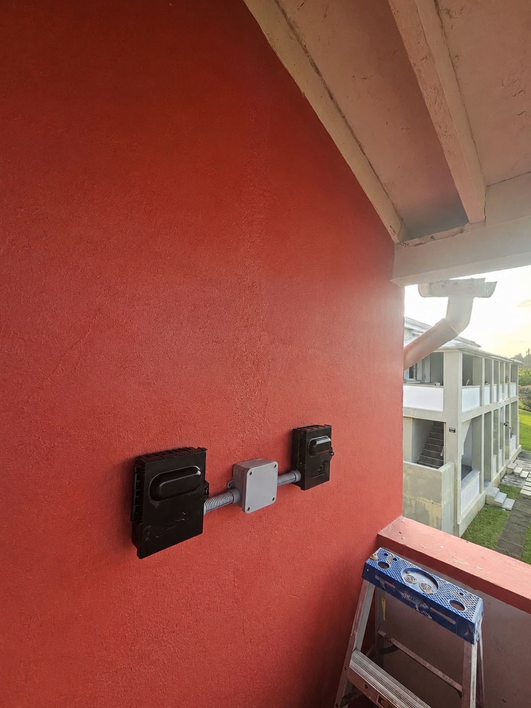 Electrical boxes mounted on wall